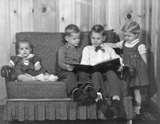 1959 One year later. Photo taken in Ted and Grace’s home. Lynn is one year old.