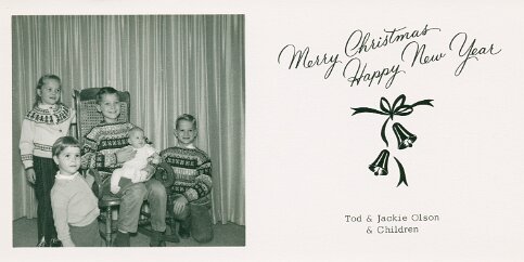 1962 In our house at 3929 Yosemite Ave, St Louis Park. John is 3 months old. We are wearing sweaters brought back from Norway by Ted and Grace.