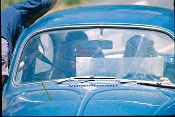 R1_026 Checking the maps in the VW. This was the workhorse vehicle that shuttled us all to the trailhead.