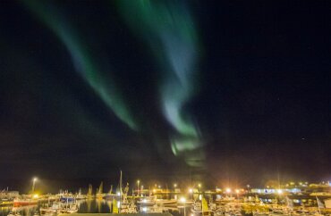 Icelandic Aurora At 66 degrees north, Husavik Iceland is one degree away from the arctic circle. This places it directly beneath the usual position of the auroral oval, that...