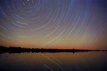 Kinnikinnik I pondered how to capture that feeling I once shared with a friend seeing the stars from zenith to horizon, then continuing beneath us as we looked out over...