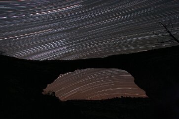 Natural Bridge Owachomo (South) The view to the south at Owachomo Natural Bridge does not include the south celestial pole, but it clearly shows the stars revolving around it. At higher...