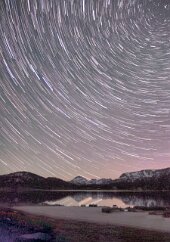 Beartooth Pass at Midnight I had been here before, in 2001, attempting to recreate a scene of the night sky reflected in a calm alpine lake. I didn’t succeed then, but here I was with...