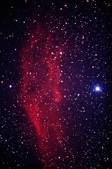 California Nebula The large red glowing gas cloud shaped like the state of California. Grand Tetons National Park 16 August 2001