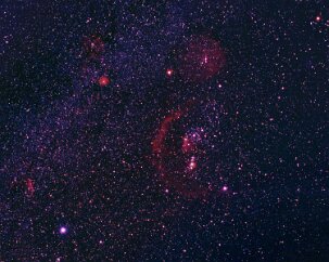 Orion and Friends The constellation Orion is a distinctive pattern in the winter sky. Here he is with some of his less visible friends. The large red arc is Barnard’s Loop, which...