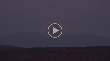 2022-Lunar Eclipse, May 15 Taken from Fort Davis TX. Clouds interfere, but are gone during totality when the background stars can be seen, apparently drifting by, but it is the moon that...