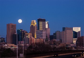 Minneapolis Moonrise The moon rises over the cityscape of Minneapolis as its buildings start to turn on their own lighting.. This is the “supermoon”, a designation for when the moon...