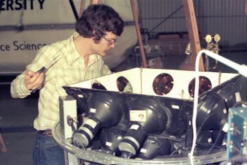 19770500 Balloon Launch T8-08 Chuck Gilman, inspecting and cleaning photomultipliers in the Cerenkov detector.