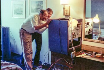 DownholeMagnetometer-8 Clark Johnson and Steve Haverberg, preparing the instrument for the bathtub test in our hotel room. The probe is behind them, connected for a baseline...