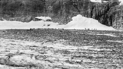 19700800-GrinnellGlacierHike-5 A hiking group finds its way across the surface of Grinnell Glacier.
