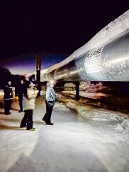 IMG_3573 On one of our night-time excursions, we stopped to see the famous Alaska pipeline, that conducts oil from Prudhoe Bay all the way across the state (800 mi) to...
