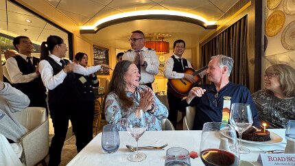 IMG_8617 In the dining room reserved for out Road Scholar group, Peter's birthday is celebrated.