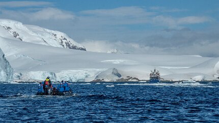 IMG_2214 As we depart, other excursion boats return, navigating the ice floes in the way.