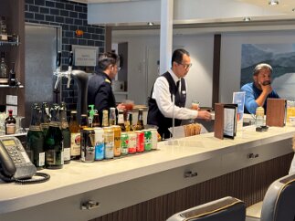 IMG_9008 The bar in the lounge was popular during the (calm parts of) the Drake Passage return.