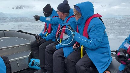 Video: A whale is sighted There's always something in the way, but you may see a glimpse of a dark hump appearing briefly at 0:26 at the left of the frame near the other zodiac.