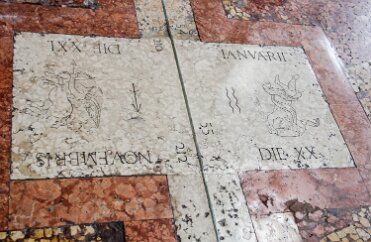 Bologna-112 It is marked with days of the year with tiles marking the signs of the zodiac along the way.