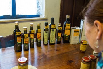 Tuscany-Siena-112 The tasting room, with a selection of virgin, extravirgin, organic and flavored olive oils.
