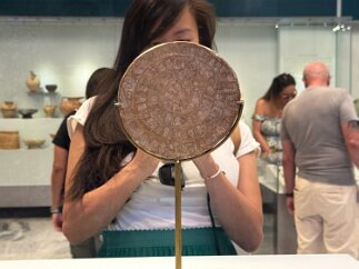 IMG_6721 The Phaistos Disc, a clay artifact stamped with an undeciphered set of symbols from 1-2 millennia BC.