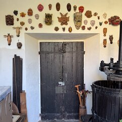 IMG_6670 Mario and Rossella's farmhouse entryway, winepress to the right.